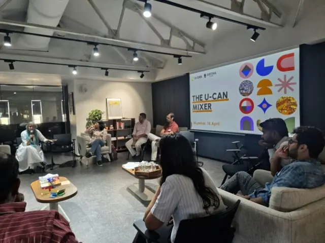 Guests in conversation at U-CAN City Mixer, Artha Global, Mumbai, April 14, 2025